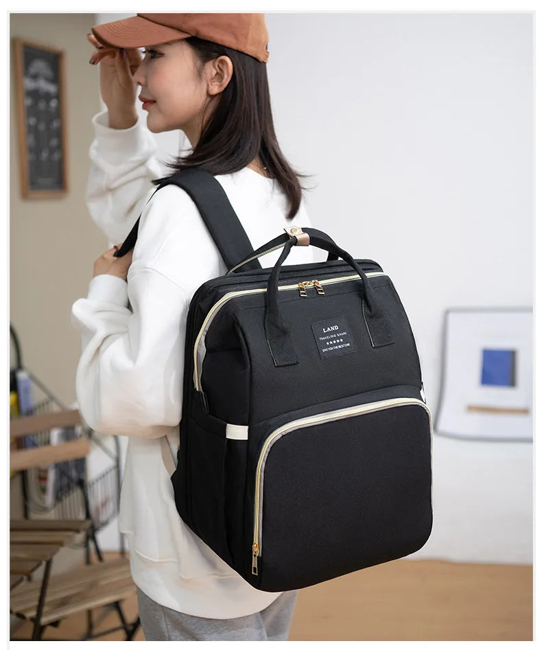 Folding Mommy Backpack with Built-In Crib