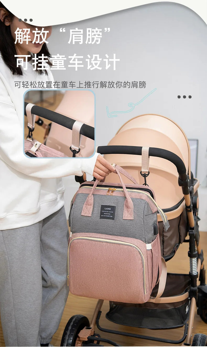 Folding Mommy Backpack with Built-In Crib