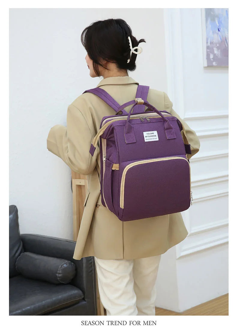 Folding Mommy Backpack with Built-In Crib