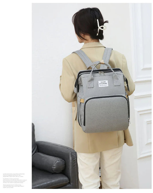Folding Mommy Backpack with Built-In Crib