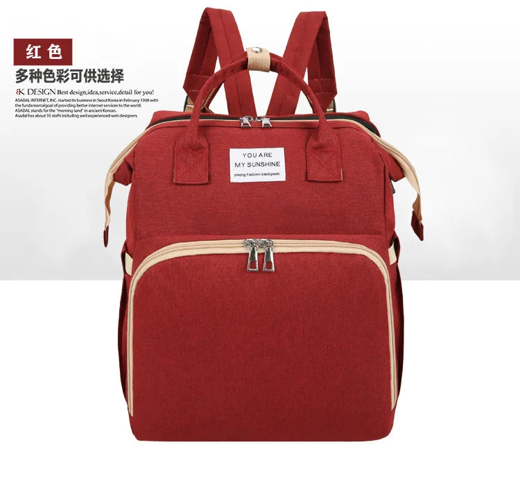 Folding Mommy Backpack with Built-In Crib
